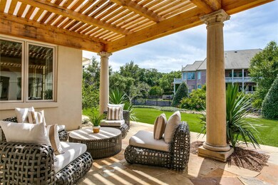 Another fabulous sitting areas with views into the backyard oasis and the beautiful water behind the home.