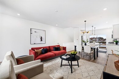 Spacious living room with an open floor plan *Phot
