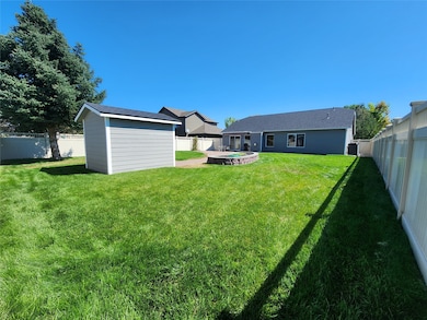 Fenced backyard featuring a patio