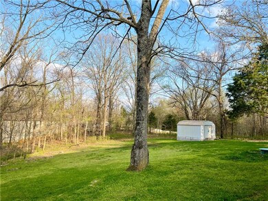 Large back yard with storage Shed