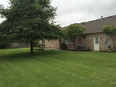 another shot of the rear of home and backyard