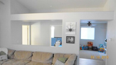 Flows from great room into den/playroom
