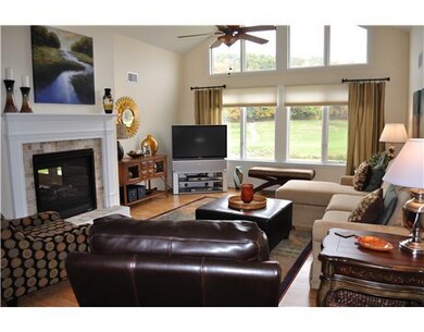 Living Room. Living Room With 2-Sided Gas Fireplac