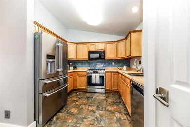 New subway tile backsplash and updated appliances.