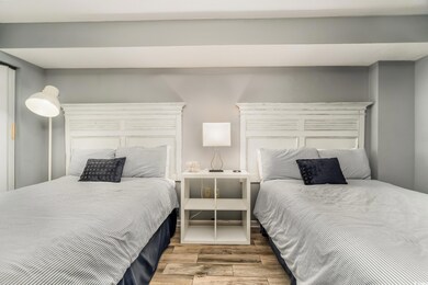 Bedroom with tile finished floors
