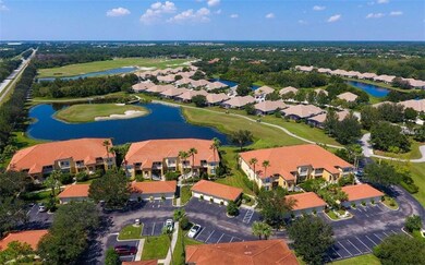 Center building overlooks lake and 17th hole.  See clubhouse in the distance - next to Tennis Center and Fitness Center.