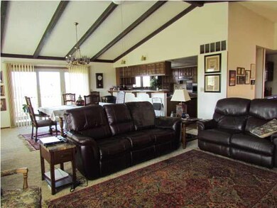 Looking into the dining and kitchen area