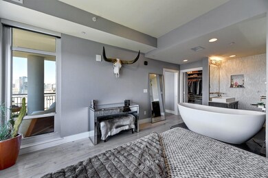 Full bathroom featuring a freestanding bath, a wa