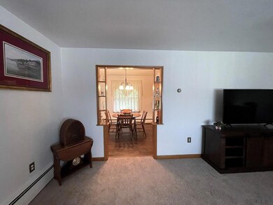 Living Room Opens to Dining Area