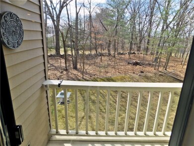 Small deck off Living Room with view of wooded bac