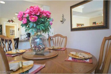 Dining room with view into open kitchen