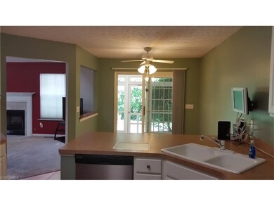 Open Kitchen to screened in porch with ceramic flo