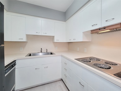 Kitchen with single compartment farm style sink