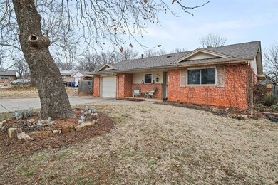 View of exterior entry with a garage