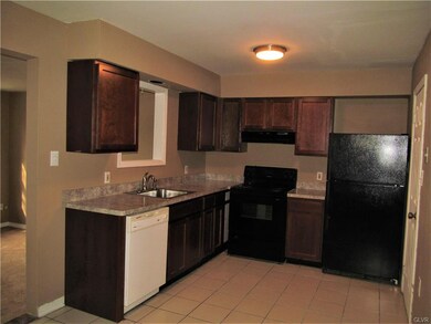 To the right is the laundry room and powder room. 