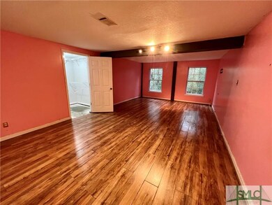 Large bedroom with double French doors