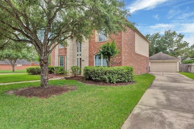 Charming two-story brick home with a well-maintain
