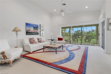 Carpeted living room with recessed lighting, visib