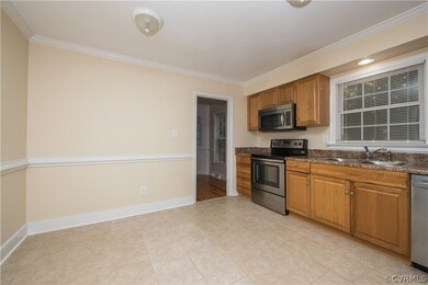 kitchen with tiled floors with eat-in dining space