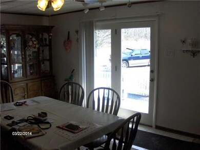 Dining Room. French doors to side deck