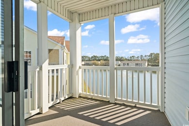Unfurnished sunroom with carpet floors and a water view