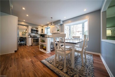 Kitchen flows easily into adjacent Dining Room and