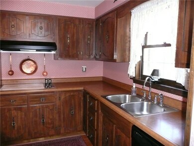 Plenty of storage in the eat-in kitchen with wall 