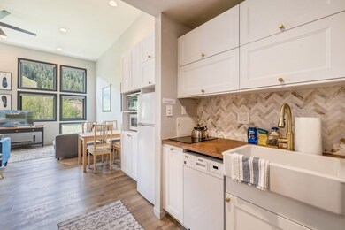 Remodeled kitchen with full sized refrigerator