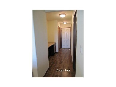 Hallway. Picture is of Similar Unit.