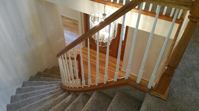 Sweeping stairs to entry