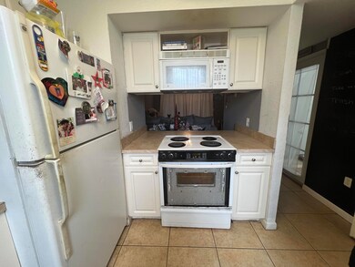 Kitchen with pass through to Living Room