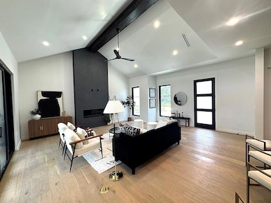 Living room featuring light wood-style floors and