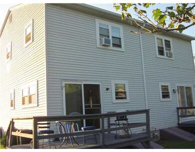 Exterior Back. Vinyl sided