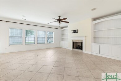 Virtual staging used to show family room function.