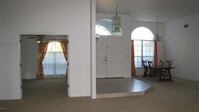 Foyer, Dining Room and Den