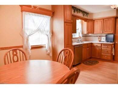 Open dining room and kitchen.