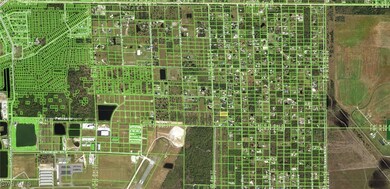 Aerial view of property's location with property p