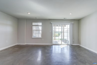 Stained and sealed concrete floor great for pets or recreational space.