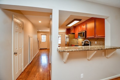 Convenient half bath and ample storage closet loca