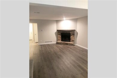 Corner fireplaces are found in each unit.