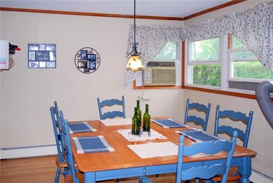 Bright Dining area with hardwood floors