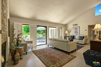 Living Area Opens to Large Pool-Access Patio