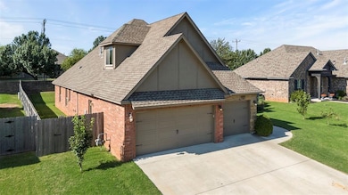 View of front of home featuring brick siding, a shingled roof, driveway, and a garage