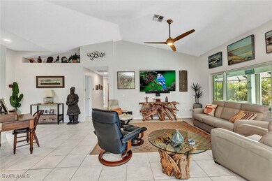Living room with light tile patterned flooring, ce