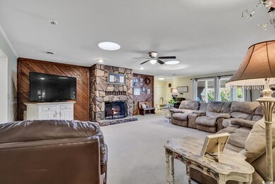 Stone accented wood burning fireplace