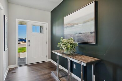 As always, first impressions matter. This welcoming and open foyer will help make a lasting one! (Model photo)