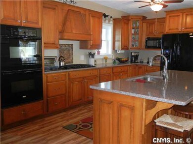 Exterior Front Double ovens, 5 burner gas stove to