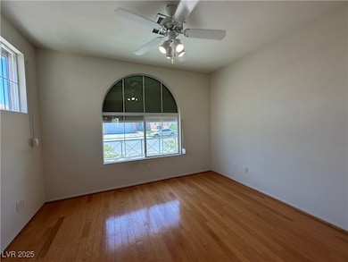 Unfurnished room with hardwood / wood-style floors