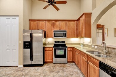 Kitchen w/granite counters, stainless steel applia