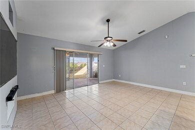 Unfurnished room with light tile patterned floors,